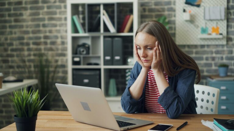 a woman feeling overwhelmed