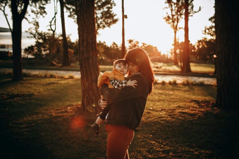 parental burnout. mom holding baby.