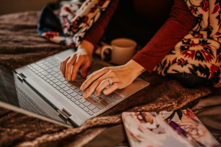 person typing on a computer