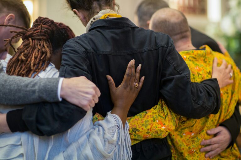 a group of people hugging